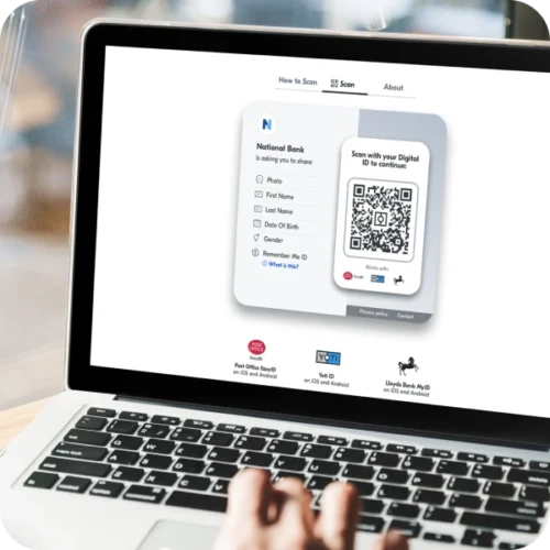 Laptop screen showing digital ID web share QR code for user to share details with bank